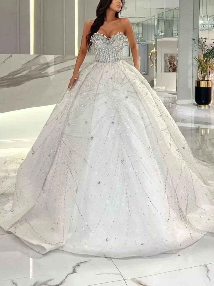 

Luxury Ball Gown Wedding Dresses Sleeveless V Neck Sparkly Sequins Ruffles Diamonds Applique Beads Bridal Gowns Vestina De Novia