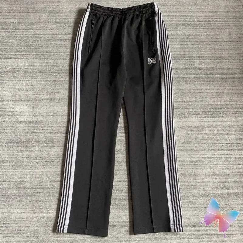 Pantalones de chándal de mariposa bordados en blanco y negro, pantalones deportivos informales de calle Hiphop con rayas laterales para hombre y mujer