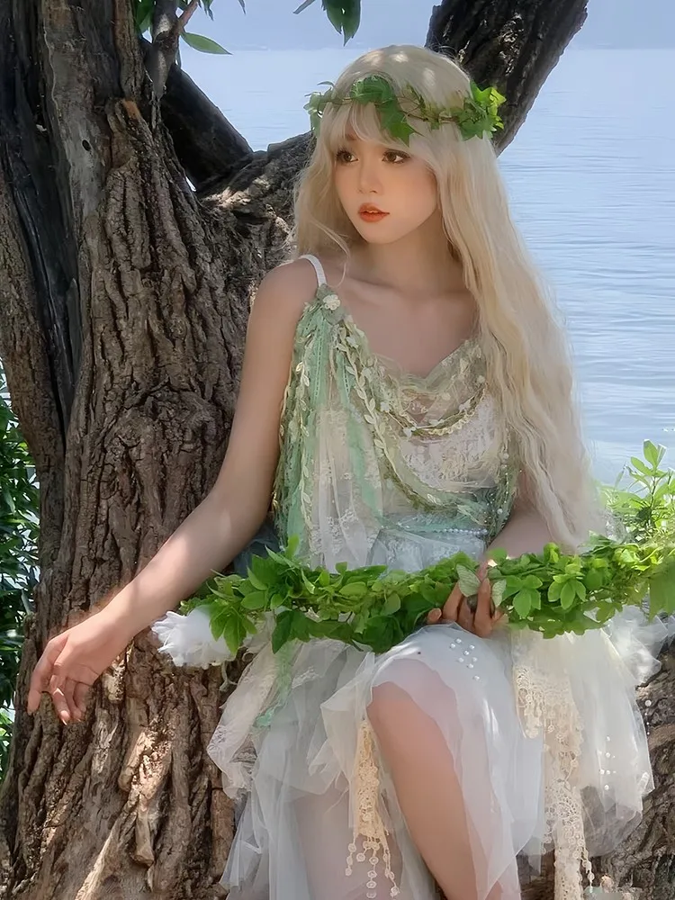 

A green sweet and pure travel photo shoot chiffon handcrafted suit dress