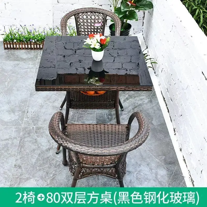 Outdoor balcony leisure table and chair courtyard rattan chair three-piece outdoor terrace rattan chair small coffee table