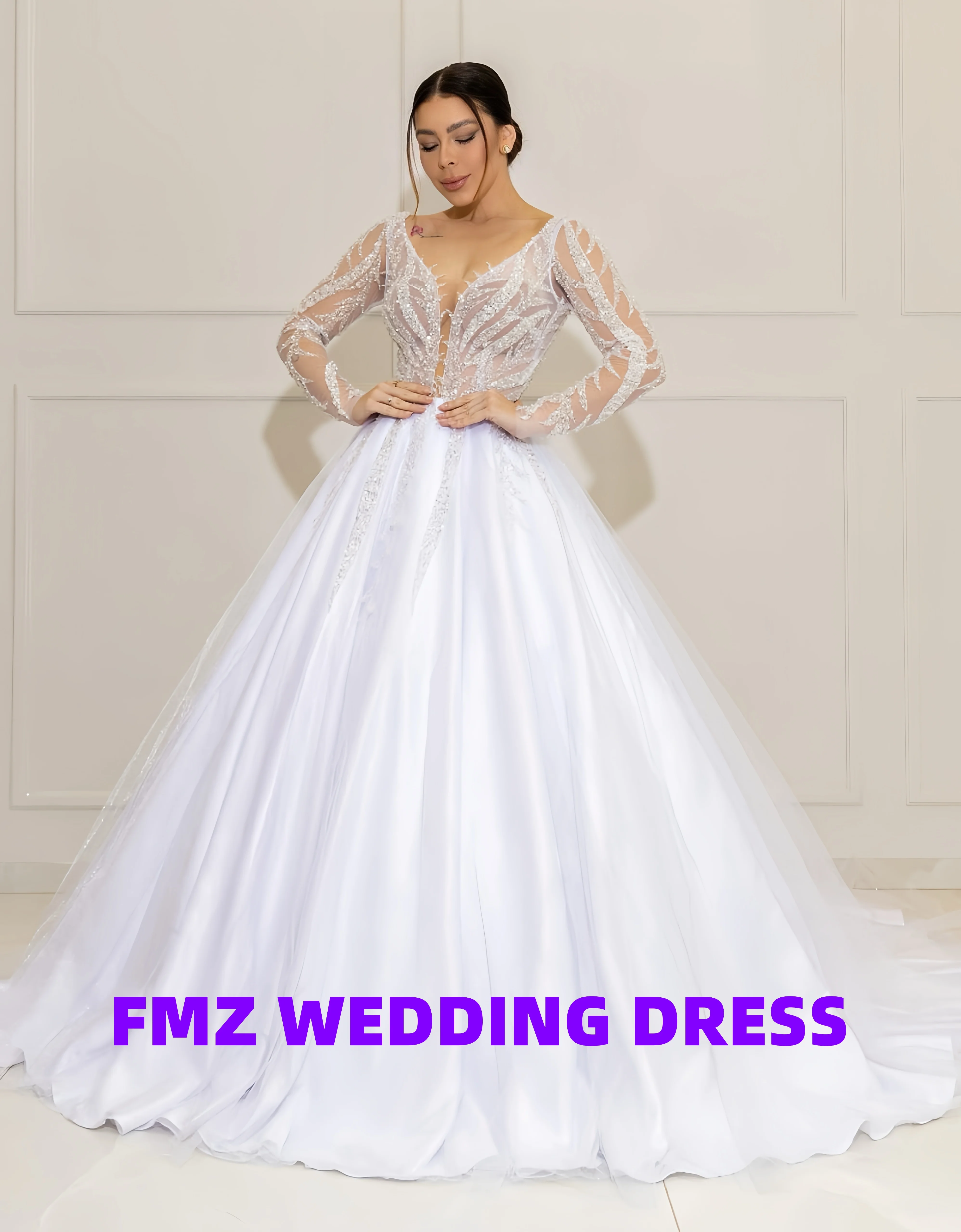 فستان زفاف فاخر مطرز برقبة على شكل حرف v وأكمام طويلة على شكل حرف a من فيستدوس دي نوفيا رداء دي ماري