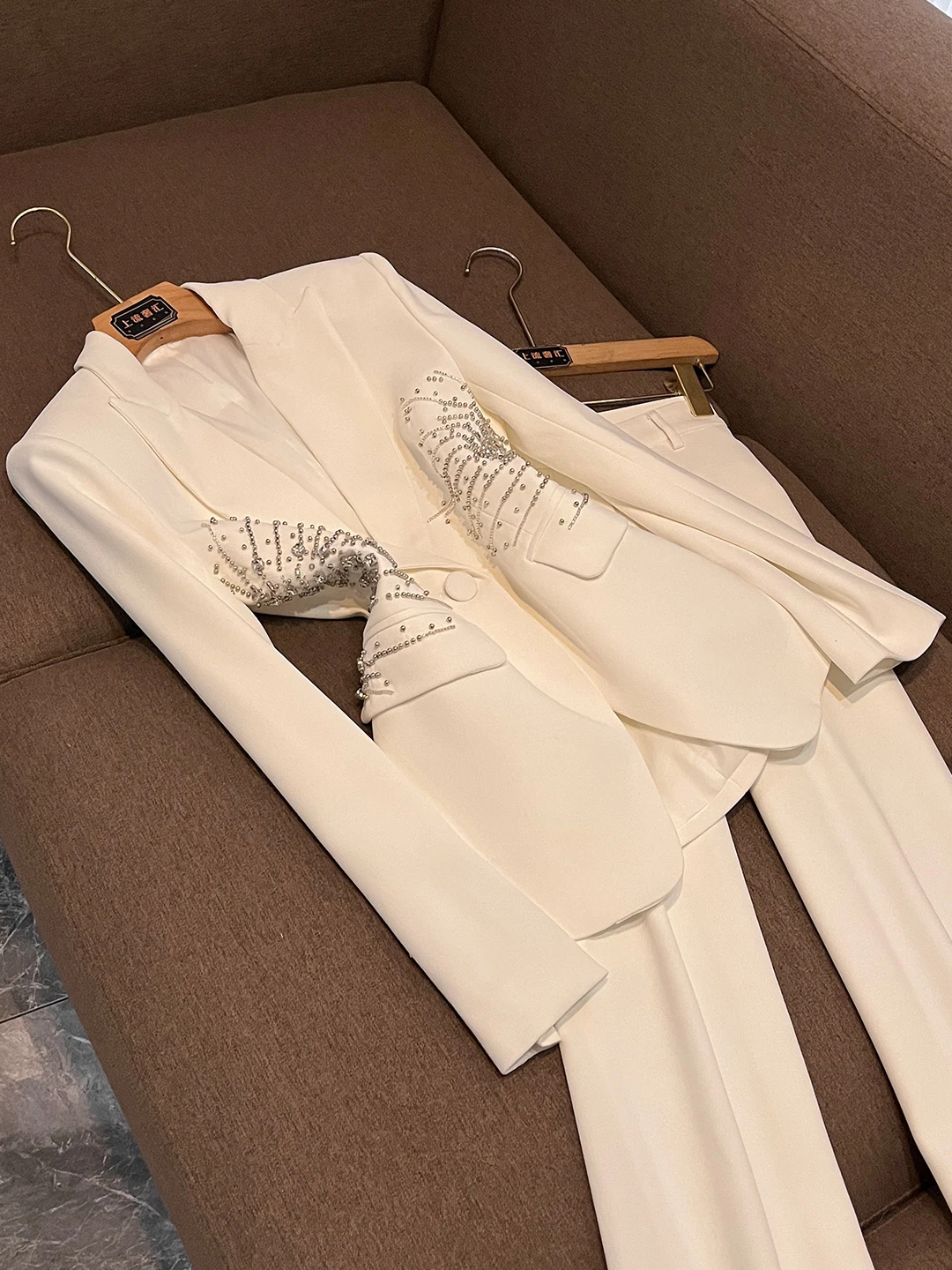 

Faionable Высококачественный комплект из двух предметов с бриллиантами, длинные брюки с тяжелой вышивкой и одной пуговицей A08058