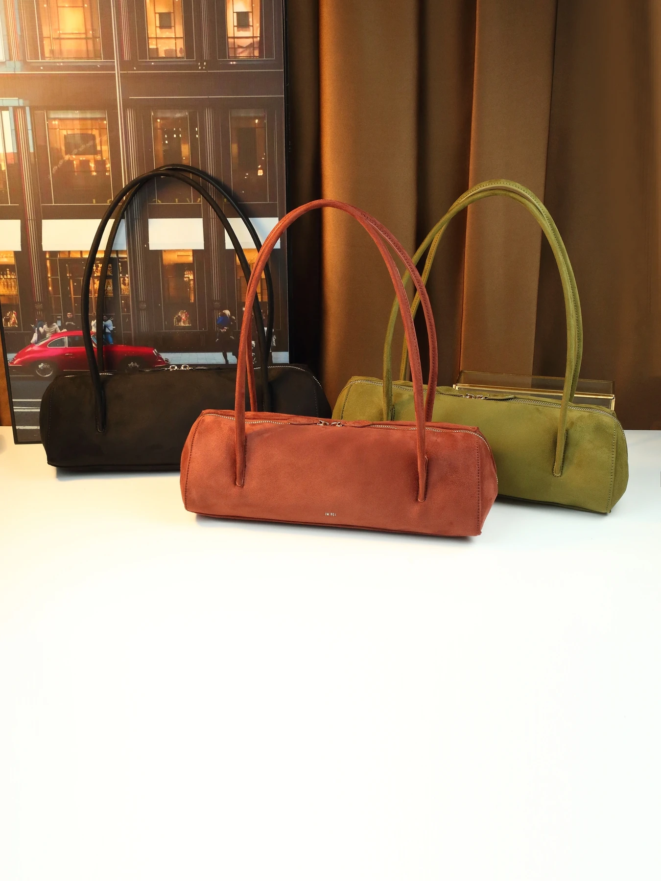 

Korean light luxury new women's go out cylindrical shoulder underarm bag imitation suede baguette bag