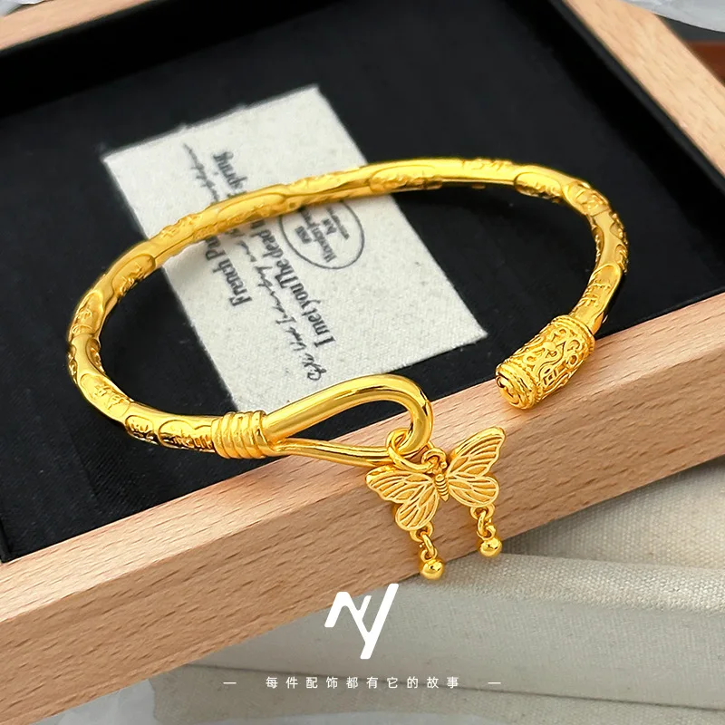 

Skin Flattering Mantra Butterfly Bell Open Bangle For Women 24K Gold AU999 Soft gold luster flatters skin with elegant exquisite