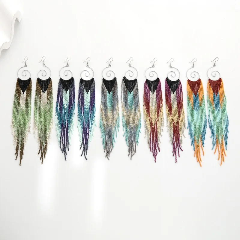 Rice bead earrings Spiral Originality Bohemia Tassel Chroma Hand knitting Alloy Female Fashion Simple Beaded earrings