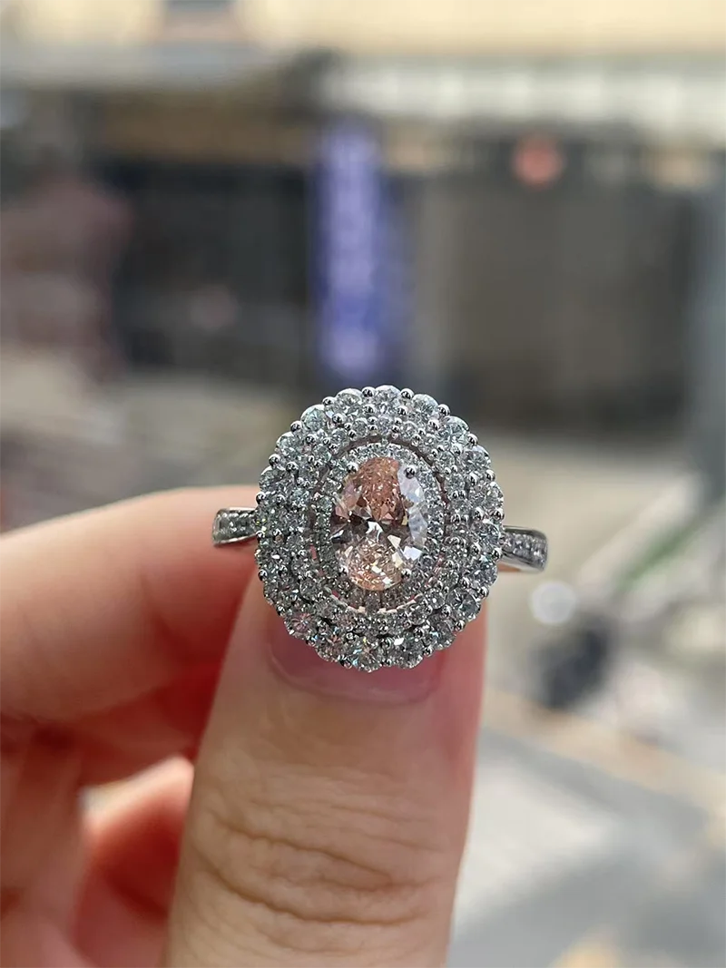 0.75 Ct Fancy Intense Pink Oval Cut Lab Grown Diamond And 0.406Ctw White Round Cut Side Stones 14K White Gold