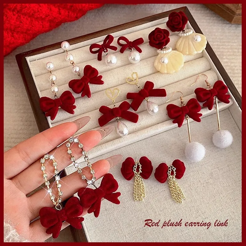 الأحمر احتفالي السنة الجديدة الزفاف المرأة الأقراط الراقية شخصية انخفاض الأقراط شكل قلب زهرة شكل فراشة عقدة الشكل