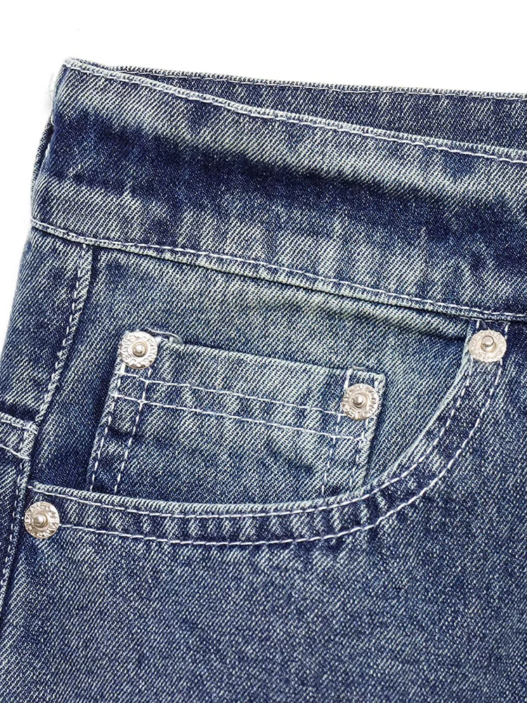 Europejski styl, nowa moda damska, uniwersalny temperament, proste, codzienne jeansy z wysokim stanem i dziurami w jednolitym kolorze.