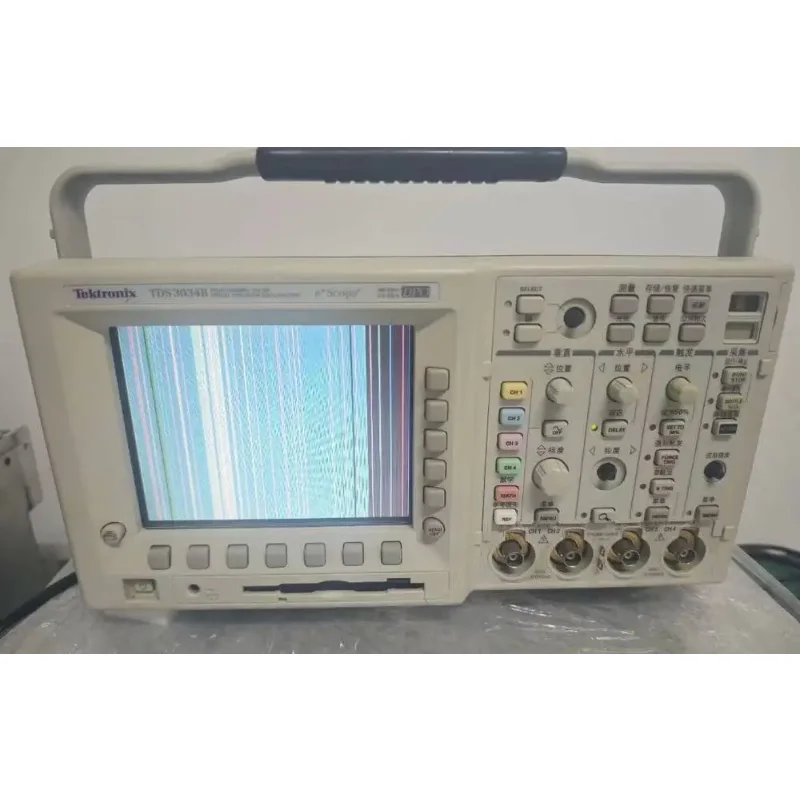 Tektronix TDS3034B 300 MHz, 2.5GS/s 4-Ch Digital Phosphor Oscilloscope DPO/