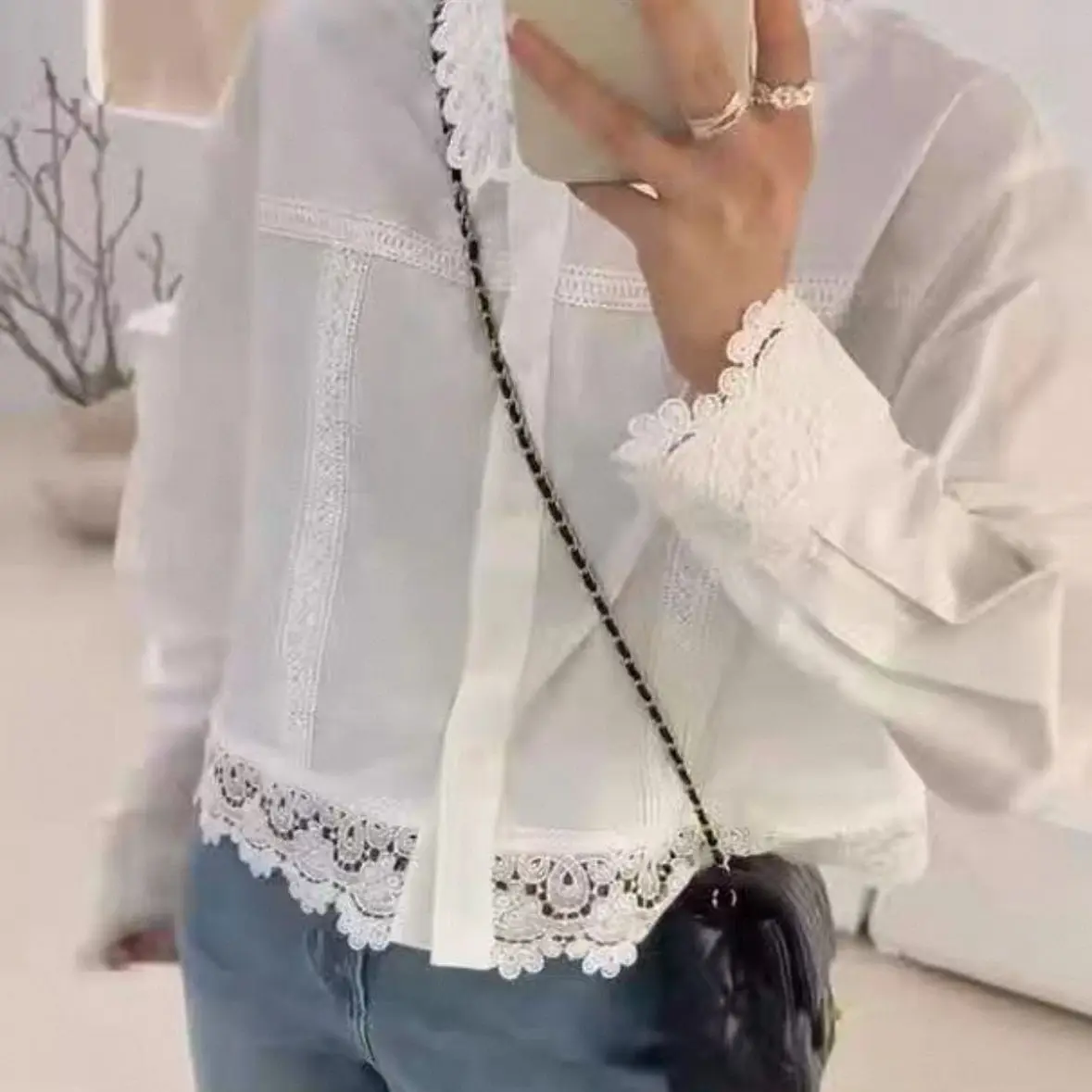 

White Lapel Hook Flower Hollow Lace Long Sleeved Shirt For Women In Spring 2025 New Sweet Short Shirt Top