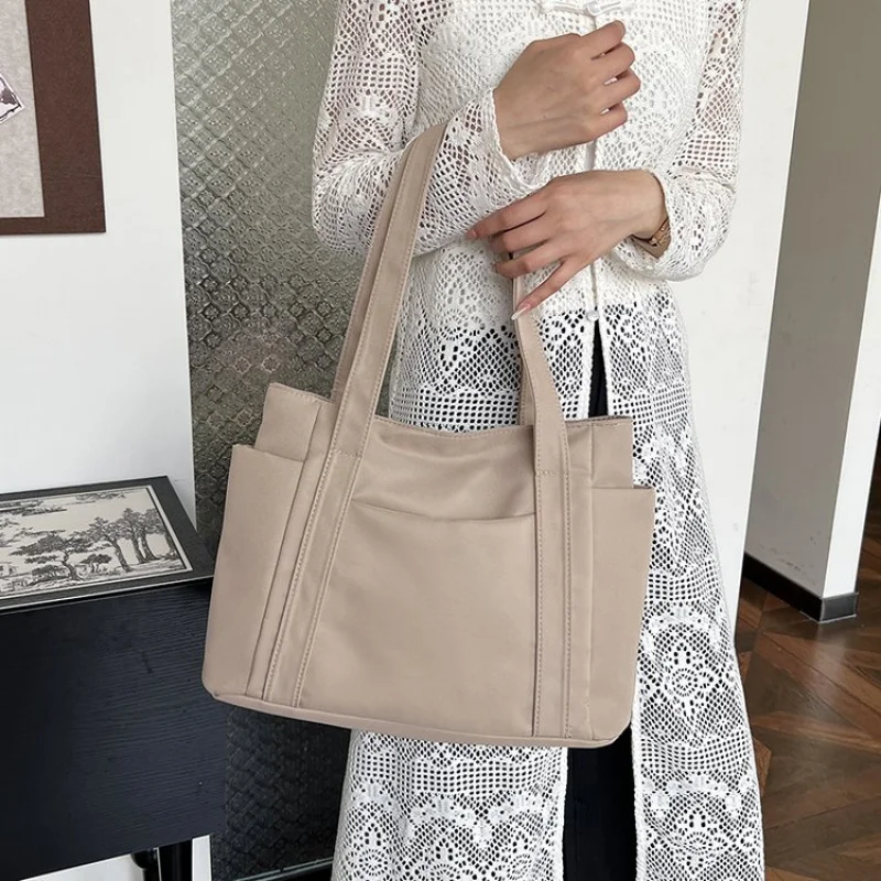 

Softly 2025 Новая женская роскошная брендовая кожаная сумка на плечо Известный дизайнер Простая популярная повседневная сумка ​