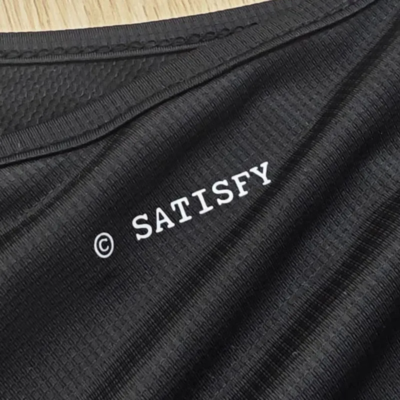 SATISFY AuraLite technology running breathable mesh alphabet reflective vest