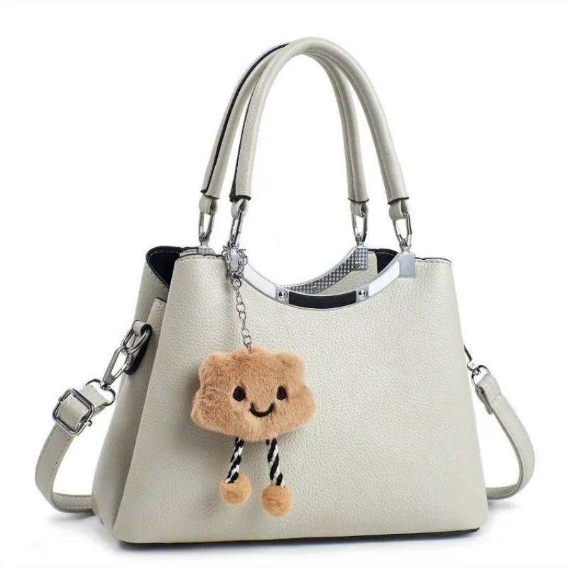 

Parisian Inspired Lock Bag For Ladies With Signature Hardware And High Quality Pebbled Leather