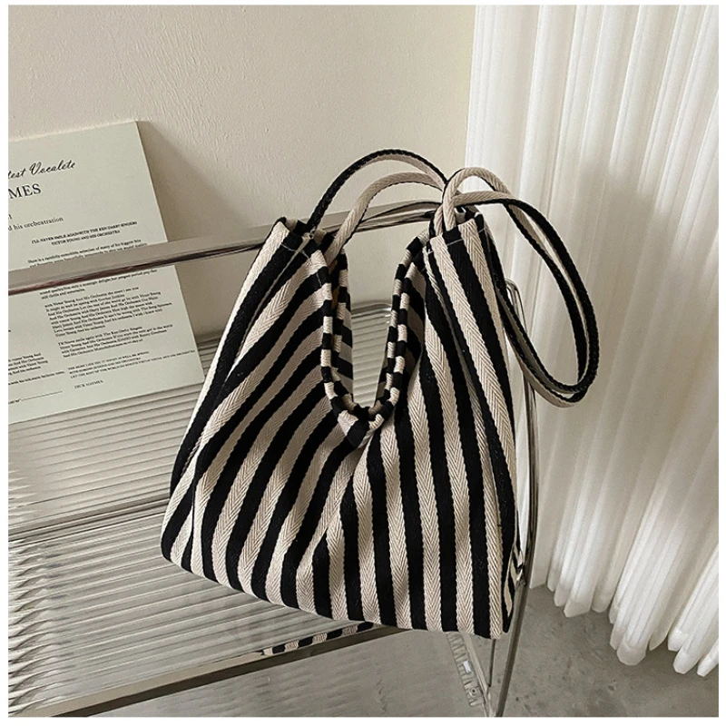 

1pcs Korean version retro literary handbag simple small fresh striped shoulder bag casual commuting fashion large capacity shopp
