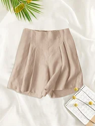 Women's casual elastic waist solid color loose shorts are elegantly oriented