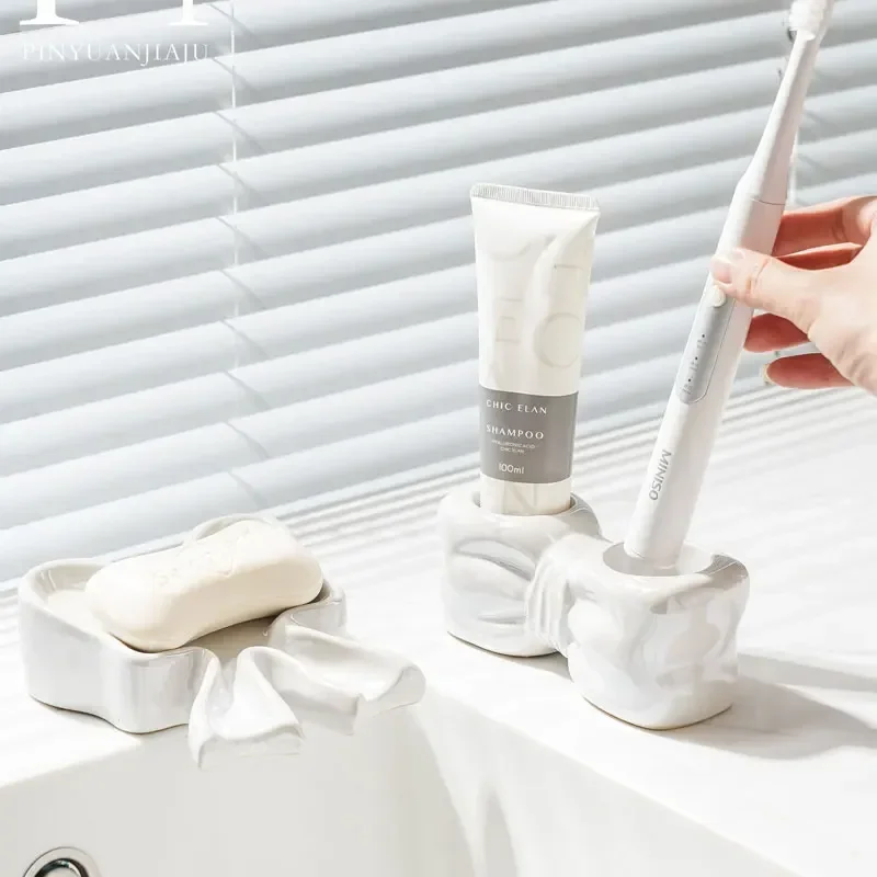 Creative bow lotion bottle electric toothbrush toothbrush rack toothpaste shelf toilet wash basin storage base cup dispenser