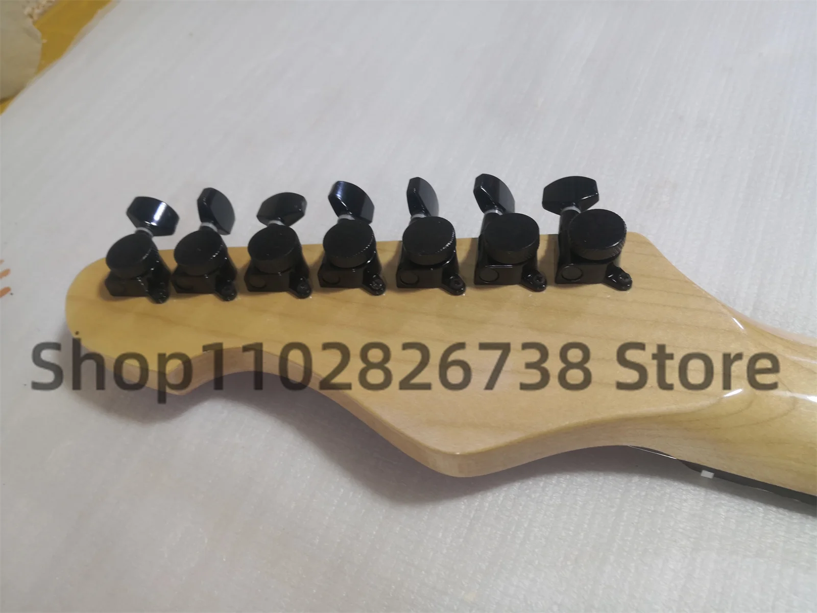 7-string Metallic Purple Electric Guitar Flash Grain body Rosewood fingerboard fixed bridge 24 Frets Rosewood fingerboard locked