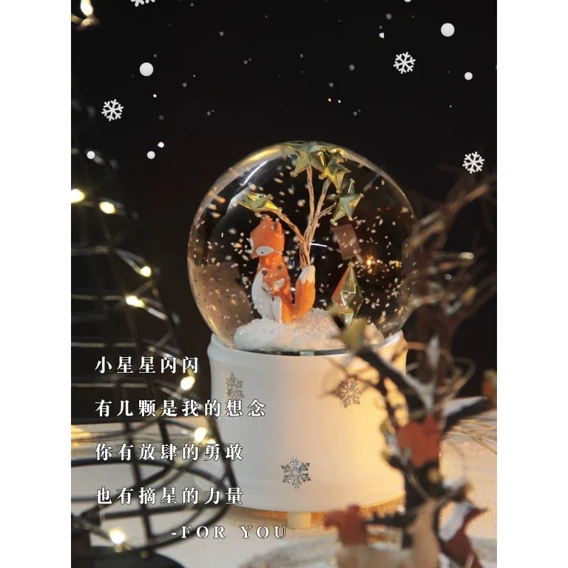 crystal ball music box dream light  fluttering snowflakes