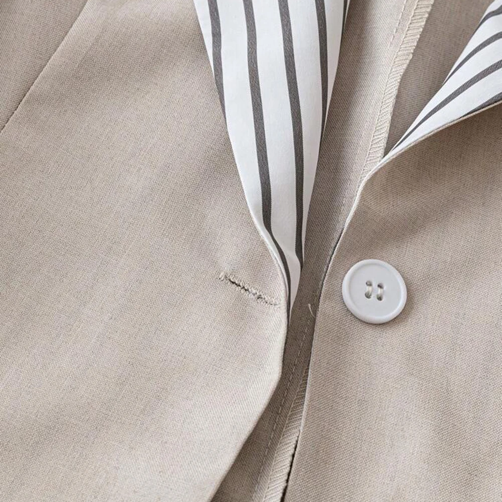 Damska marynarka z klapami, zapinana na guziki, z kieszeniami, długie rękawy, jednolity kolor, styl casual, do noszenia przez cały rok.