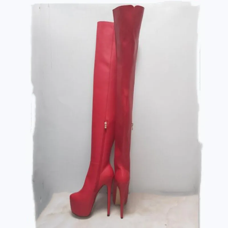 Fashionable women's boots. About 15 cm high heels. Fashion show banquet shoes. Over knee high women's boots. Round toe pumps.