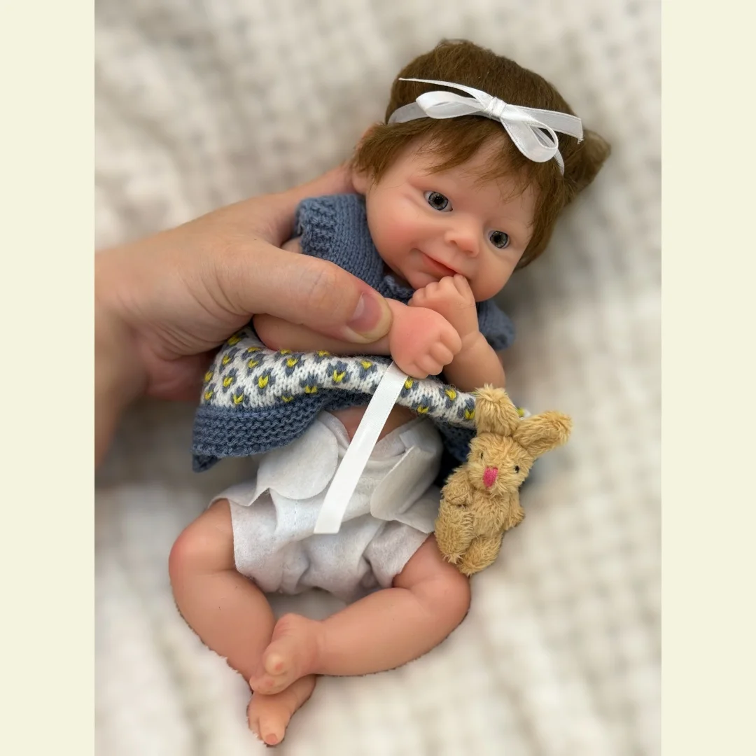 10Inch Open Eyes Soft Silicone Bebe Reborn Girl With Rooted Hair Dress in Sweather Outfits Lifelike Realistic Newborn Doll