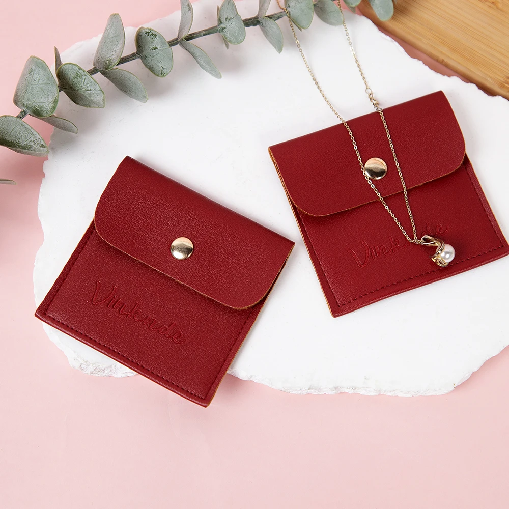 Bolsa de joyería con logotipo personalizado, bolsa de regalo con botones de cuero PU rojo, bolsas de joyería con cierre a presión, perfecta para anillos, collares y dijes