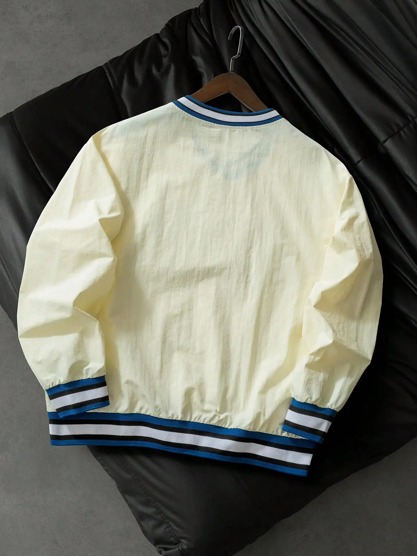 Stylish Men's V-Neck Embroidered Pullover Sweatshirt—Featuring a Collegiate Athletic Style, Perfect for a Comfortable Commute.