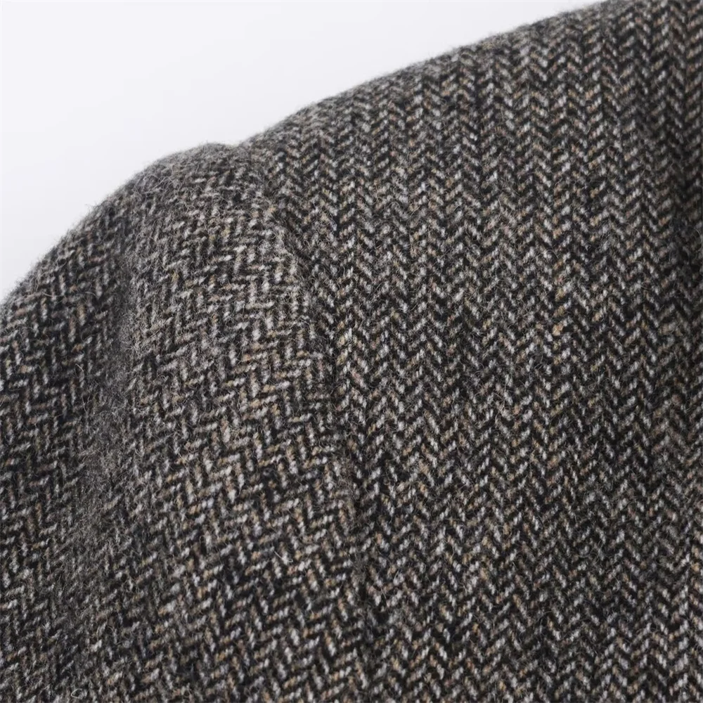 Jaket setelan wanita gaya kerja musim gugur dan musim dingin terbaru dengan kerah lipat, lengan panjang, bantalan bahu, dan pola herringbone.