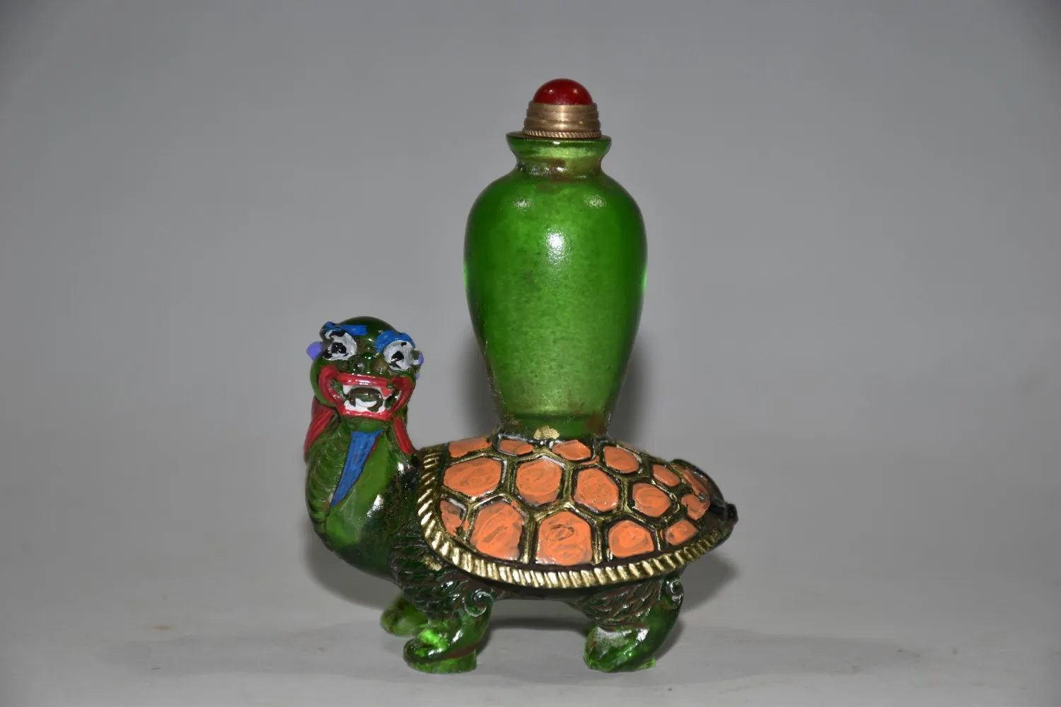 

Early collection of glass-painted colorful dragon turtle vase snuff bottle decorative items, finely crafted.