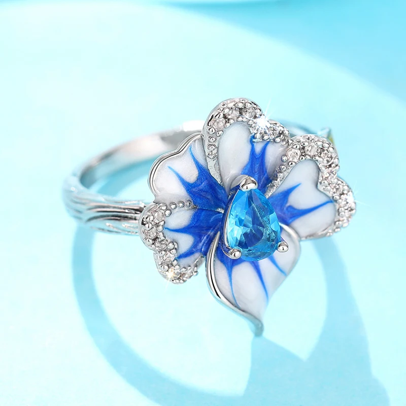 Huitan, diseño único de flor azul esmaltado, anillos para mujer, pera, cielo azul, CZ, anillos estéticos para mujer, joyería elegante para fiesta de boda para mujer