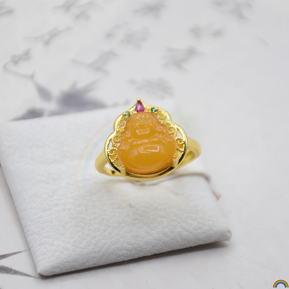 

Natural aged beeswax Buddha ring alloy inlaid with honey chicken oil yellow retro Chinese style big belly Buddha ring Rwbuye