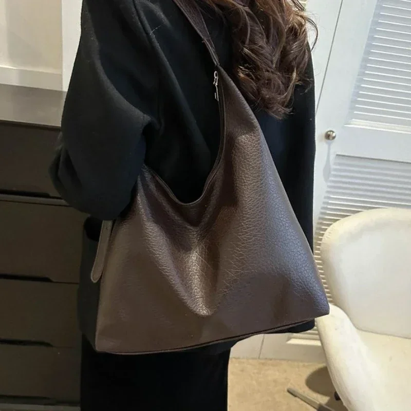 حقيبة يد جلدية أنيقة للنساء 2025 الاتجاه الإناث بسيطة كبيرة عالية السعة حقيبة كتف حقائب اليد النسائية حقيبة ساع