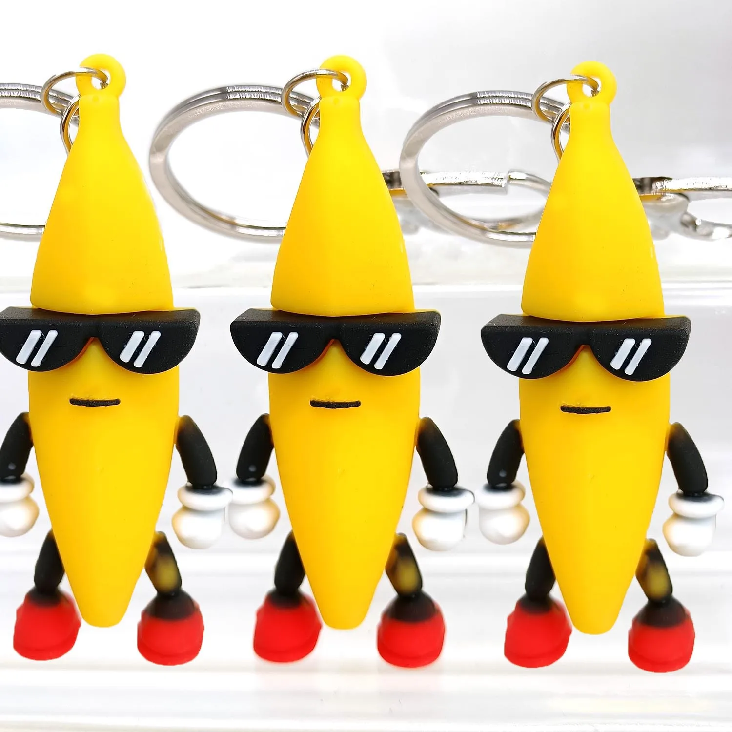 2Pcs Novelty Funny Simulation Cool Banana Keychain Pendant Creative Sunglasses Banana Backpack Decoration Pendant Halloween Gift