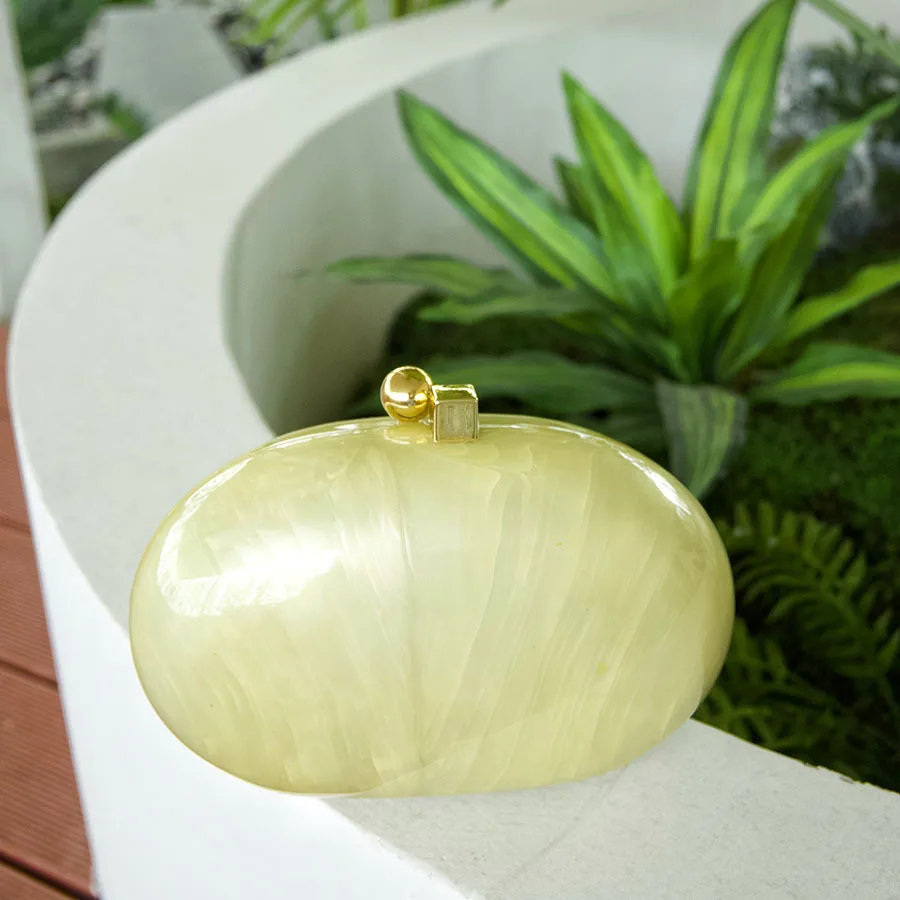 

Сумка-коробка с мраморным зыбучим песком, акриловая сумка-ракушка, банкетное гусиное яйцо, сумка-мессенджер.