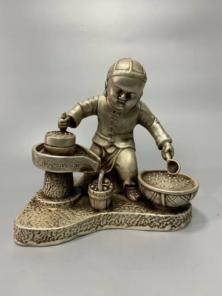 

Old Chinese Tibet Silver Handmade Boy Ingots Wealth Statue