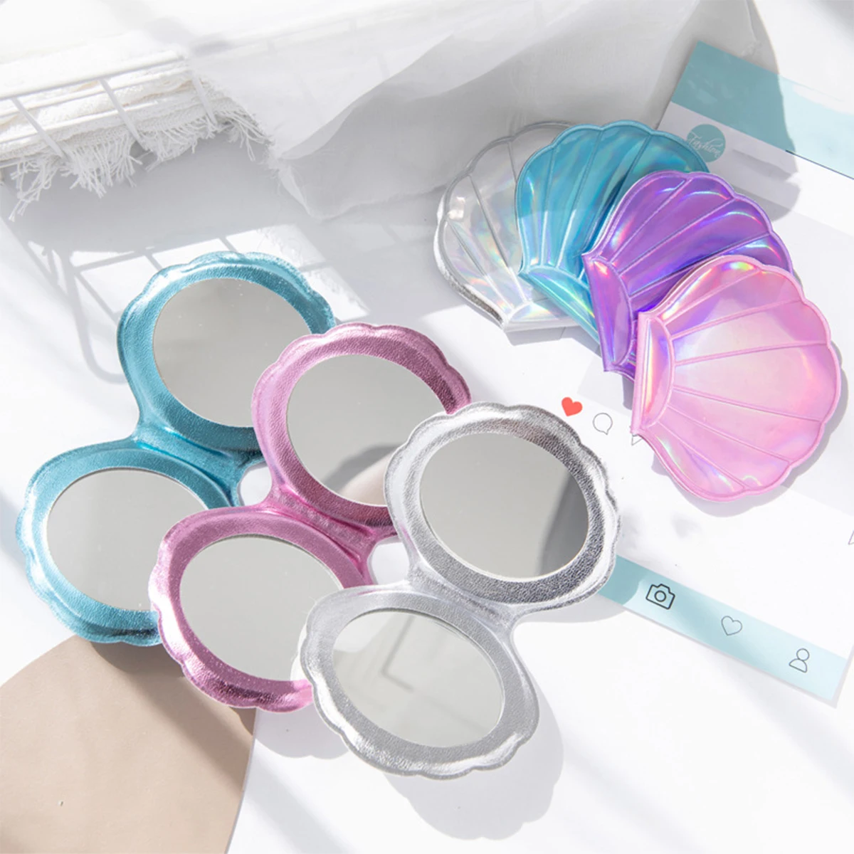 กระจกแต่งหน้าพกพาสองด้าน ลายเปลือกหอยวิ้งวับสีสันแฟนตาซี รุ่นนางเงือก ขยาย 2x/1x