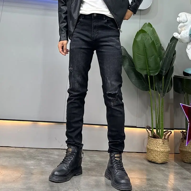 カウボーイデニムブラックフェイクリップドジーンズメンズトレンドブランド秋冬2025新作ファッショナブルな伸縮性スリムスキニージーンズパンツ男性用