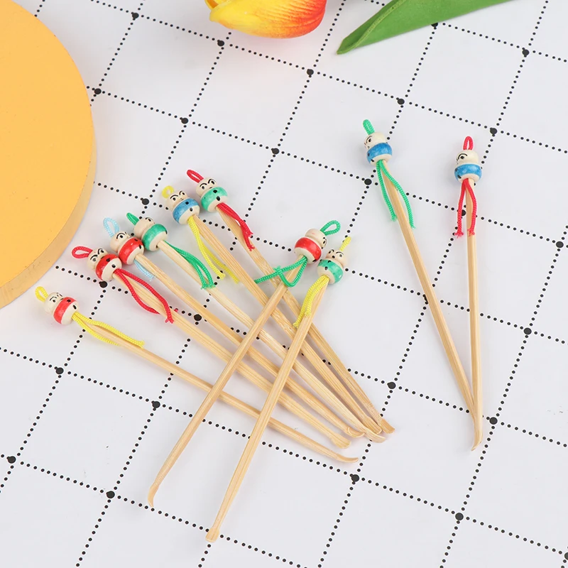 10 pcs/lot Cartoons Cute Mini Doll Ear Picks Wood Bamboo Ear Picks Wax Remover Cleaner Ear Care Tool Random Color Hot Selling
