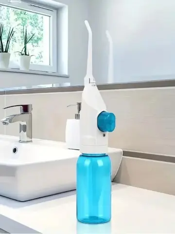Irrigatore orale ad alta pressione per uso domestico Denti portatili Acqua pulita Filo interdentale Stuzzicadenti manuale ad acqua ad alta pressione