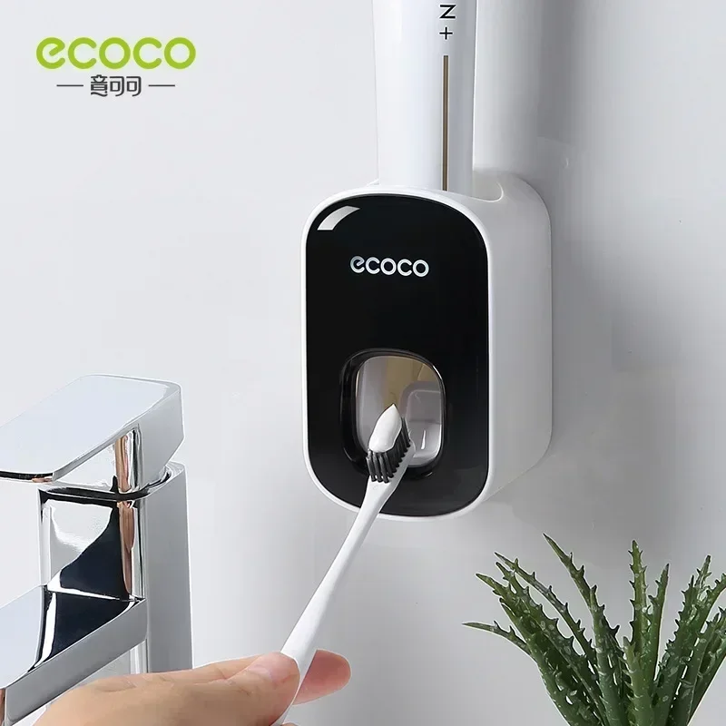 ECOCO Fully automatic toothpaste squeezing suction wall mounted squeezer for household non perforated toothbrush storage rack