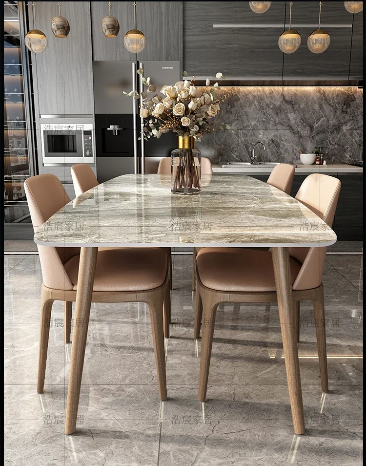 

Nordic rock slab dining table modern simple light luxury household small apartment rectangular solid wood marble