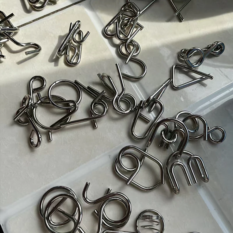 เกมปริศนาโลหะ ฝึกสมอง วงแหวนลวดมหัศจรรย์ ปริศนาถอดล็อค วงแหวนเหล็ก ปลดล็อค ทดสอบไอคิว สำหรับเด็ก ของเล่นเสริมพัฒนาการ