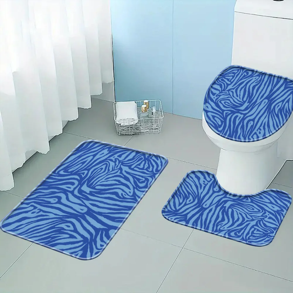 

Blue Zebra Stripe Bathtub Set Three-Piece Toilet Lid and U-Shape Carpet Modern Simple Bathroom Decoration