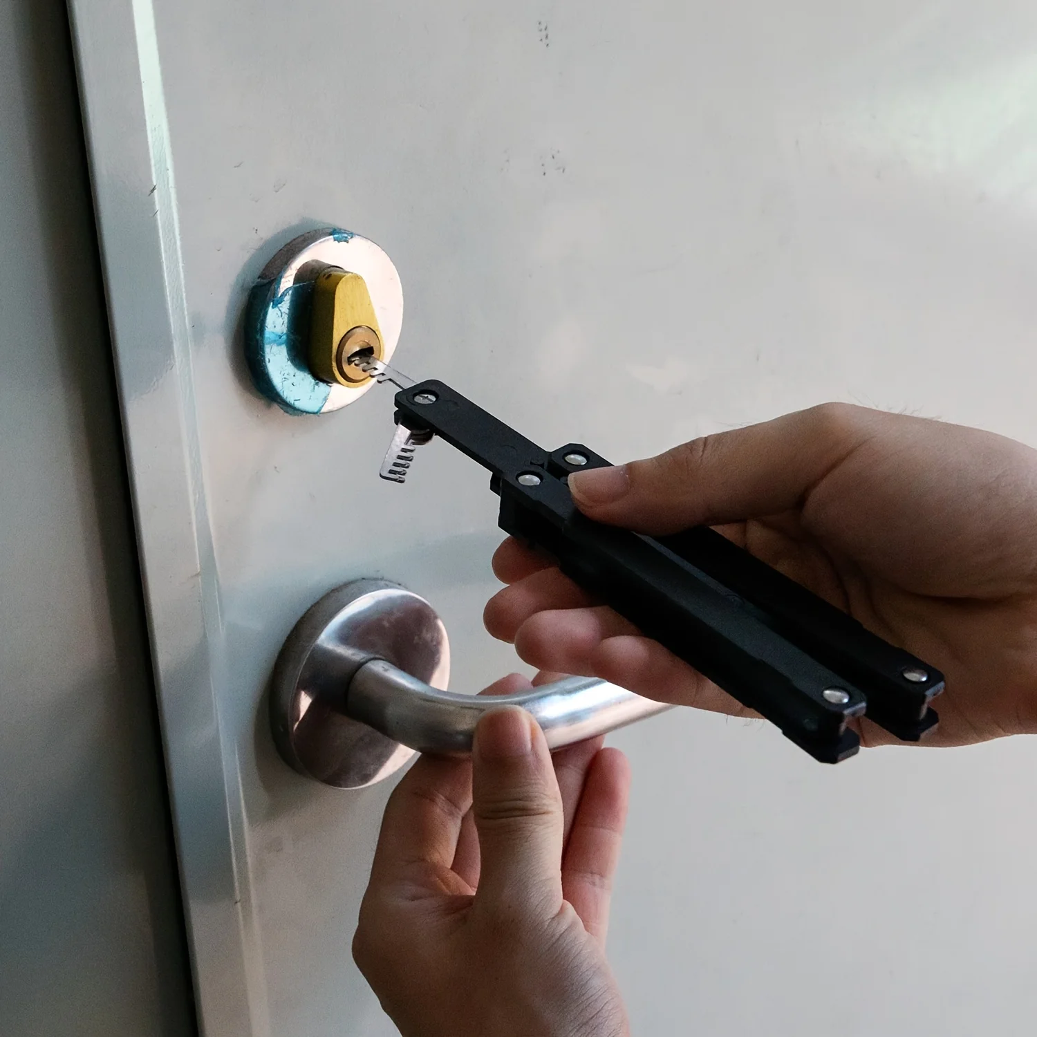New Portable Lock-Picking Tool - Durable Stainless Steel Material - Multiple Ways To Pick Locks - Compact And Foldable Pickaxe