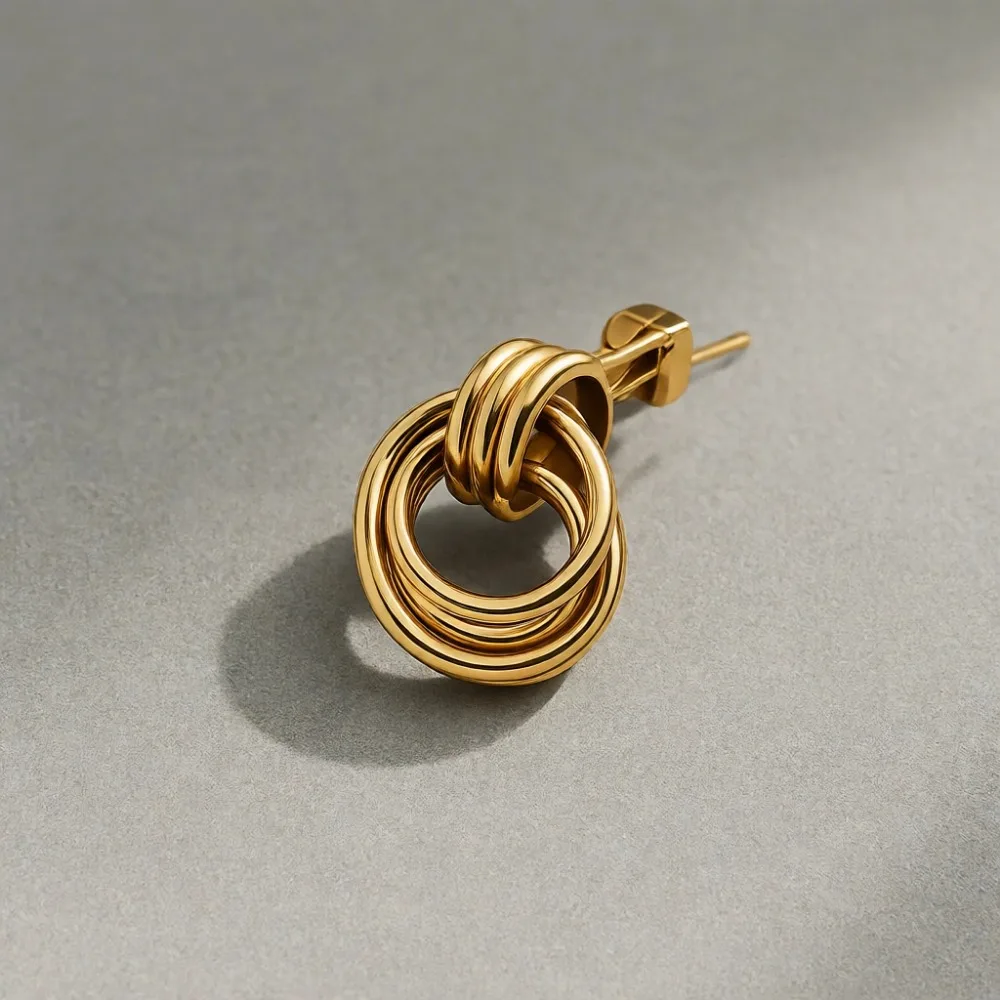 

Легкие серьги-клипсы с позолотой 14K, в виде узлов, маленькие, изящные, без прокола, с подвесками-кольцами