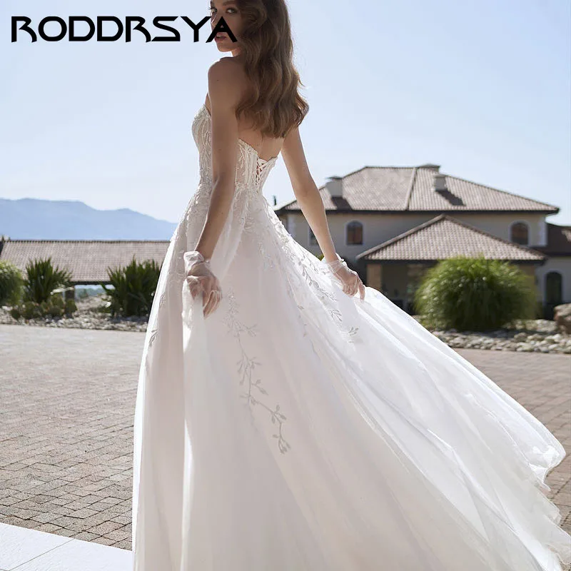 RODDRSYA Sweetheart Crystal Spaghetti Strap Wedding Dress Elegant Tulle Sleeveless A-Line Bride Party Sexy Backless Trouwjurk