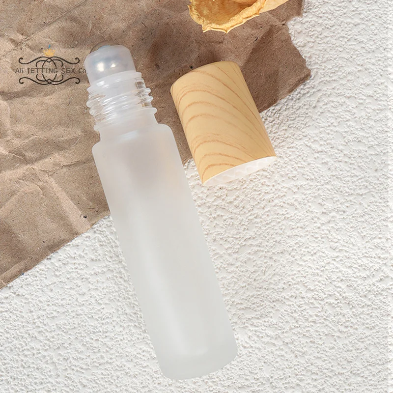 5ml10ml Frosted แก้วขวดลูกกลิ้งไม้พลาสติกสําหรับน้ํามันหอมระเหย Roll-On ขวดลูกกลิ้งสแตนเลส