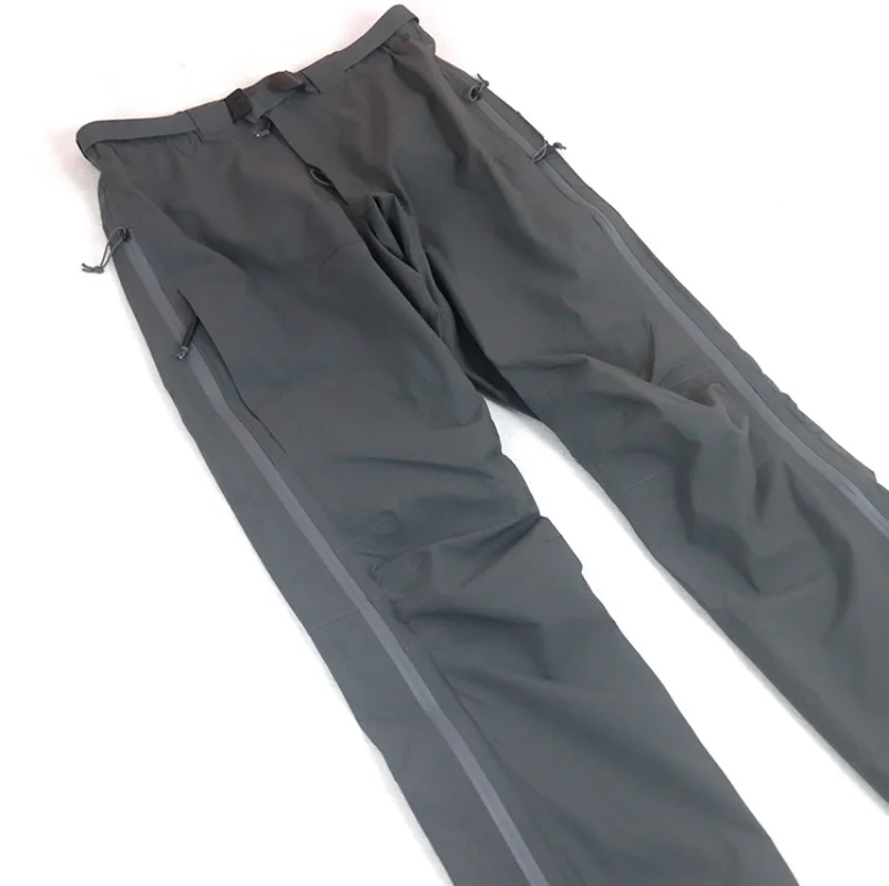 Pantaloni funzionali da alpinismo Rainstorm Rush, guscio rigido, resistente alla pioggia, cerniera laterale