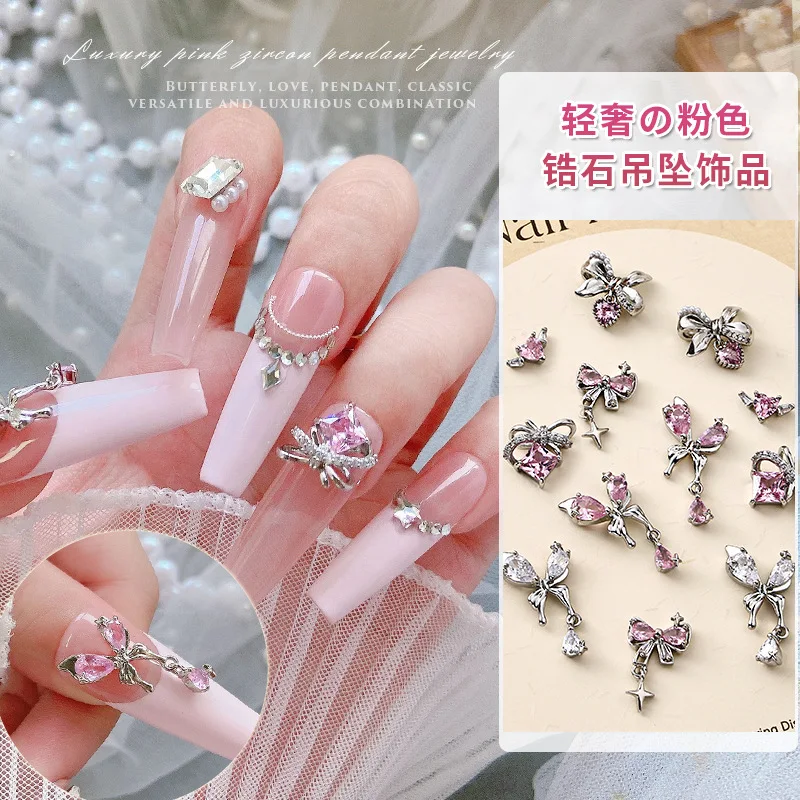 New Hot Selling Nail Rhinestone Pink Zircon Bow Pendant Jewelry New Light Luxury Silver Butterfly Love Diamond Nail Accessories