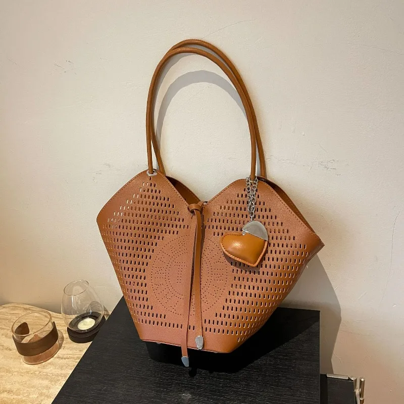 

2025 New Women's Korean Niche Design Tote Bag - Casual Commuter, Large Capacity Woven Cutout, Stylish Trendy Shoulder